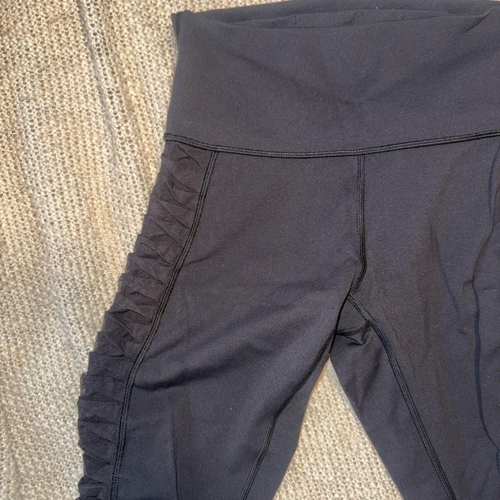 High-Waist Black lululemon capri legging with ruched mesh side detail
